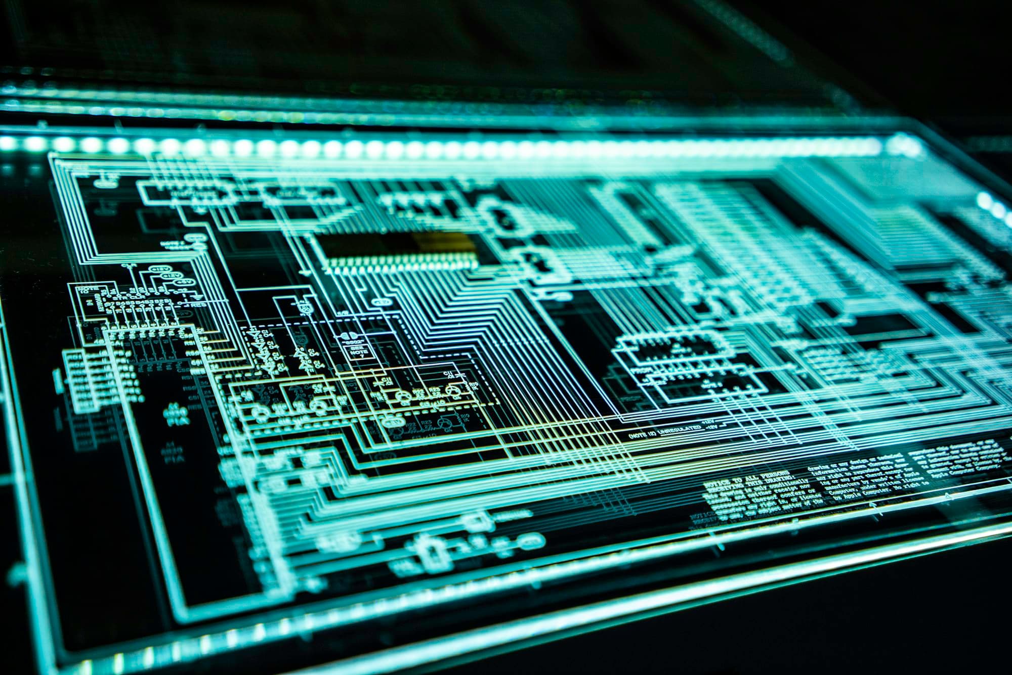 Illuminated circuit-board schematic under inspection